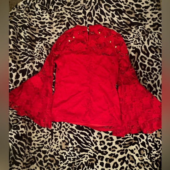 Bracelet-length bell sleeves top with lace and peek-a boo shoulders. - Picture 4 of 5